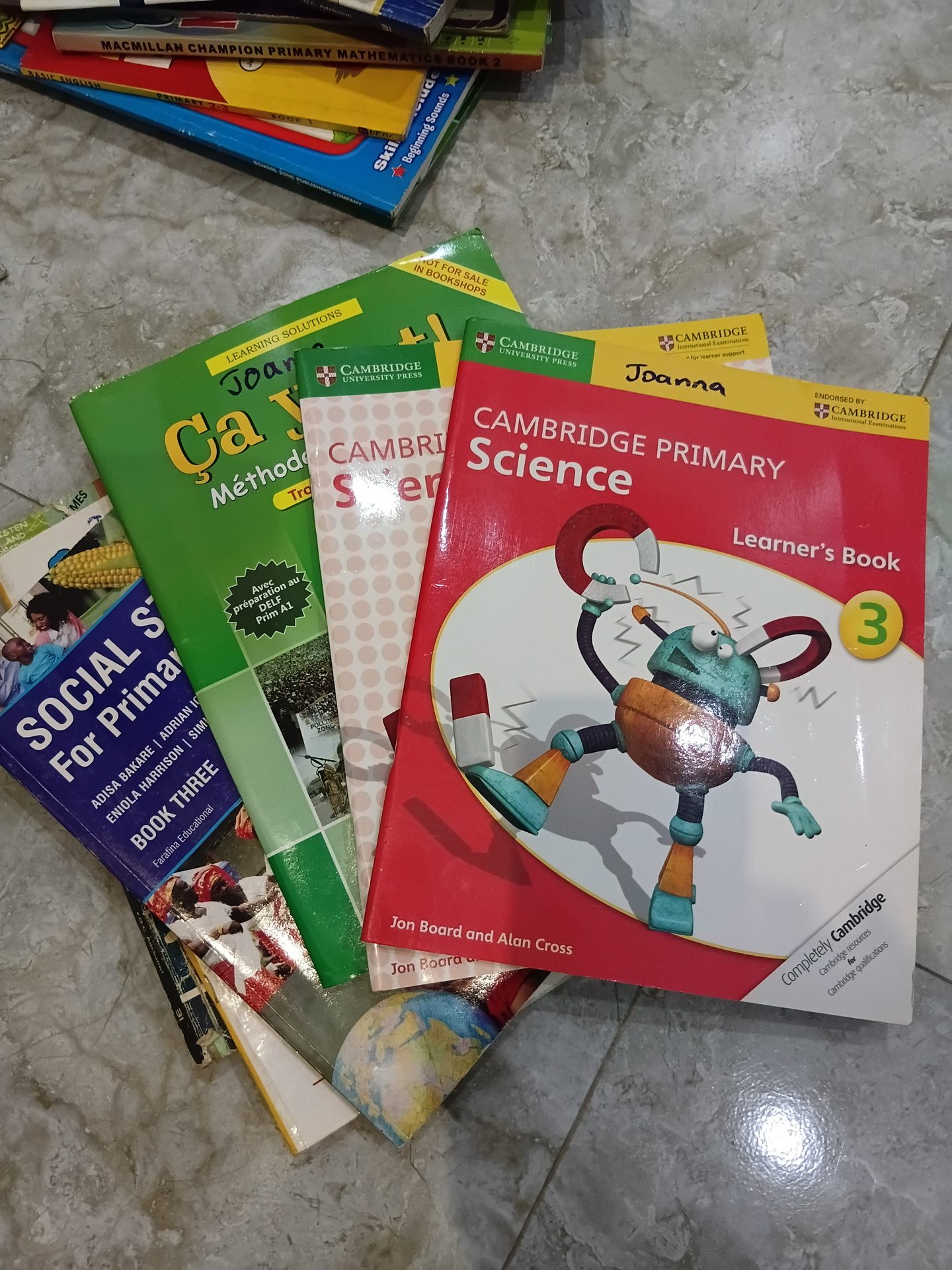 Text books,  primary 3